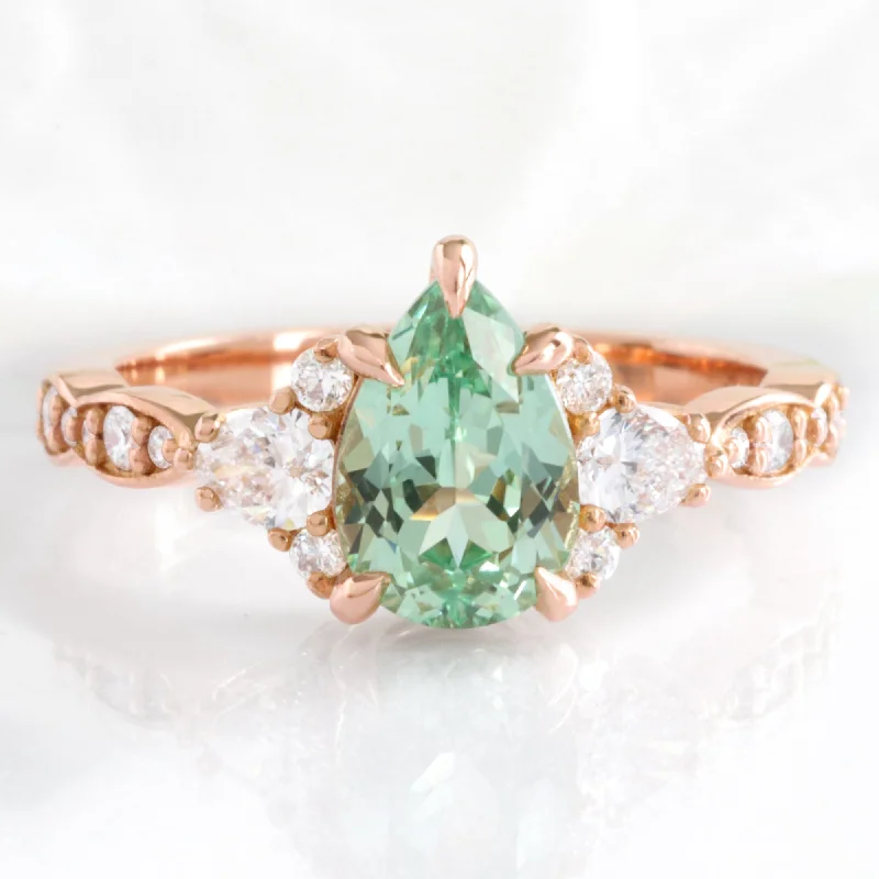 gold solitaire engagement rings for women -2.2 Ct. Pear Green Sapphire Ring in Dahlia 3 Stone Diamond Band