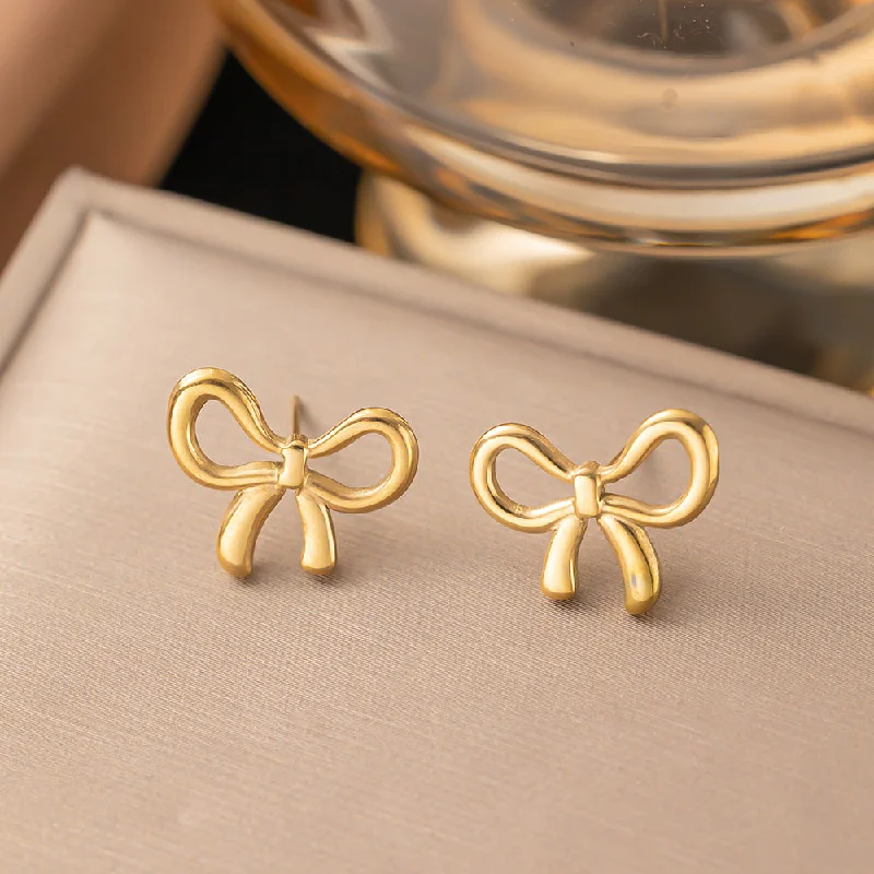 Gold stud earrings